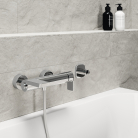 ORAS STELA vannas maisītājs no sienas ar izteci pa kreisi un pārslēdzēju, hroms