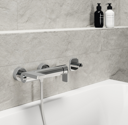 ORAS STELA vannas maisītājs no sienas ar izteci pa kreisi un pārslēdzēju, hroms